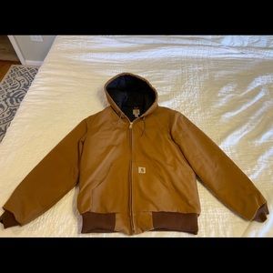 New without tags Carhartt medium, insulated, flannel lined, firm duck jacket.